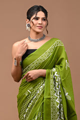 Pure  Mul cotton Hand print saree with Blouse.