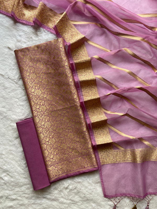 Pure Banarasi Brocade Weaved Jaal Unstsiched Suit With Organza Zari Work Dupatta.