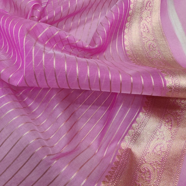 Pure Organza Silk Handwoven Silver And Gold Zari stirp Work Saree.