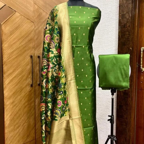 Banarasi katan Silk Zari weaved Suit With Zari and Resham Weaving Dupatta.