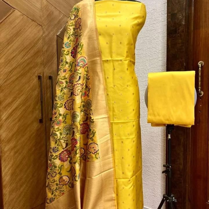 Banarasi katan Silk Zari weaved Suit With Zari and Resham Weaving Dupatta.