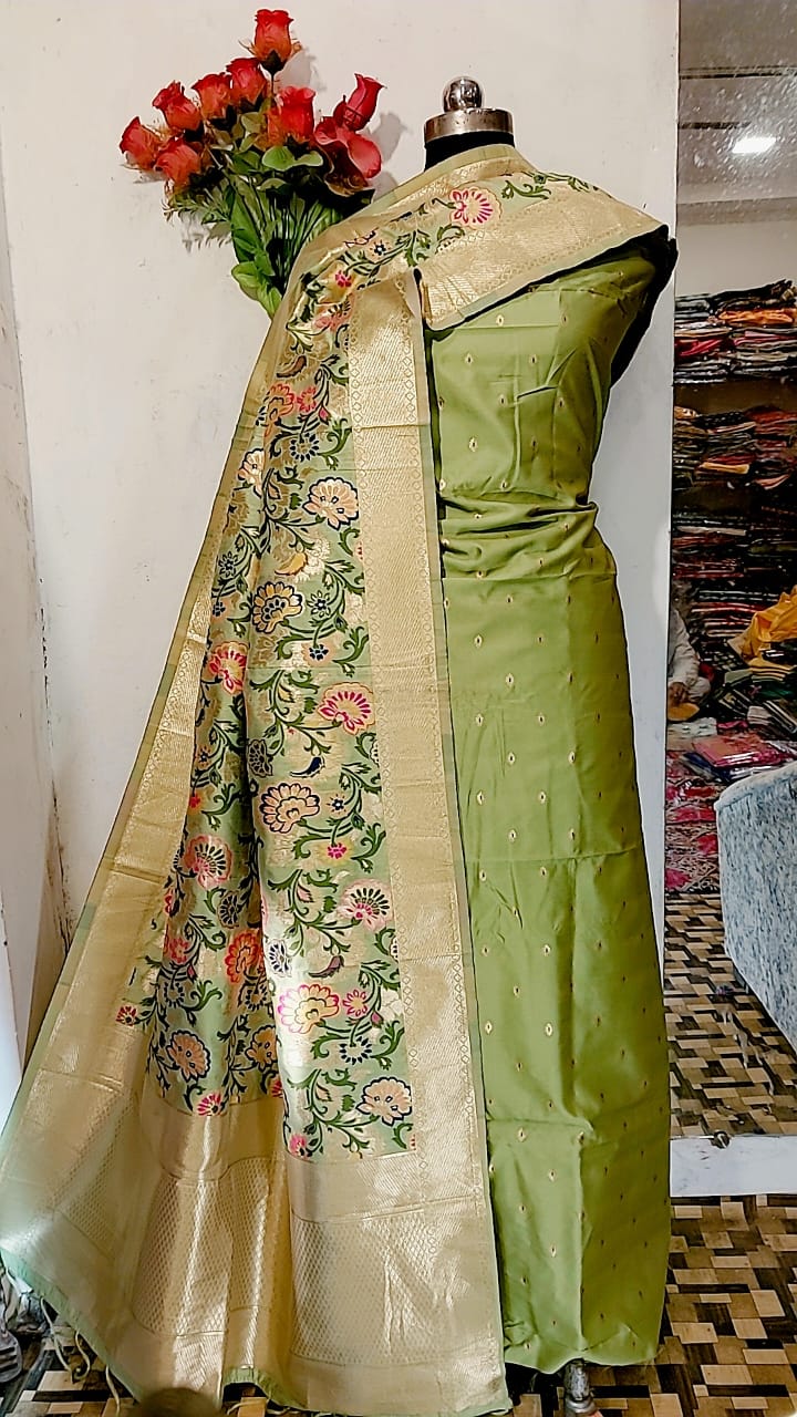 Banarasi katan Silk Zari weaved Suit With Zari and Resham Weaving Dupatta.