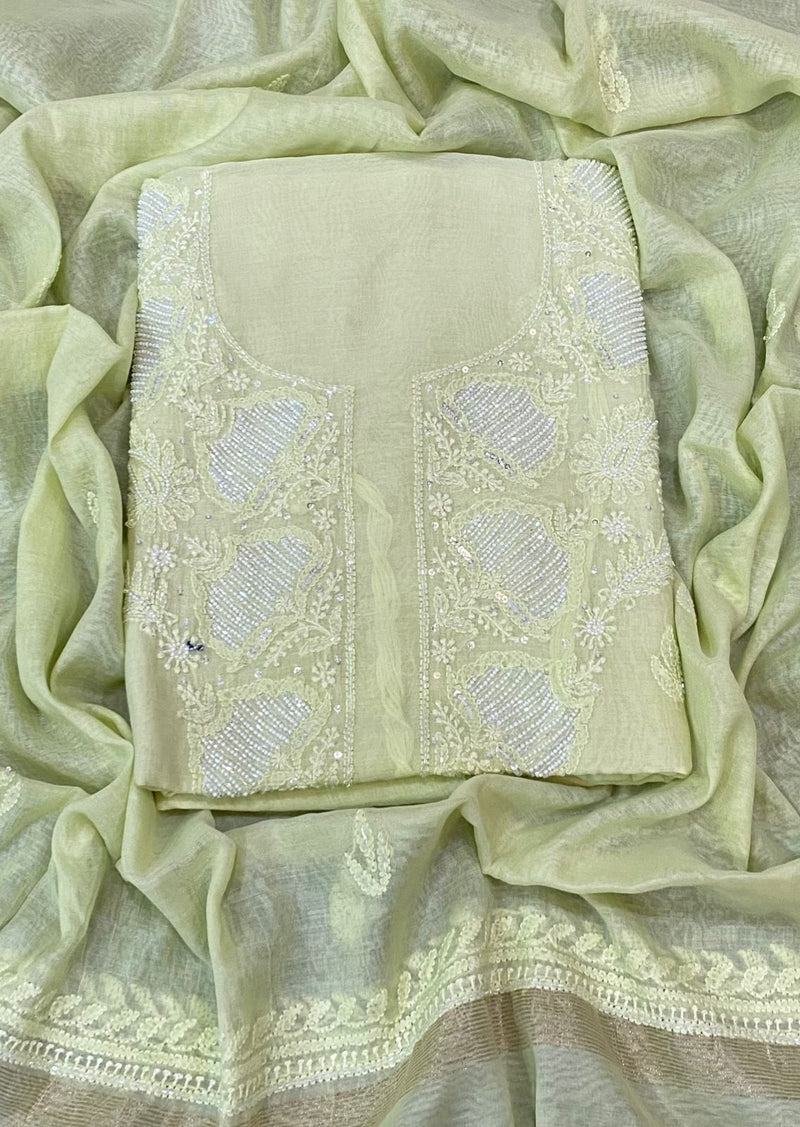 Light yellow Color Pure Mul Mul Chikankari and pearl cutdana Work Unstitched Suit