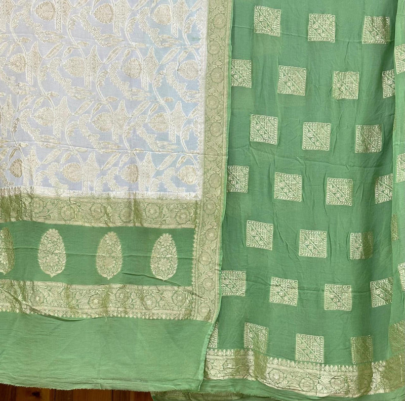 Handloom made Pure Khaddi Chiffon Unstitched Suit With water Zari Work.