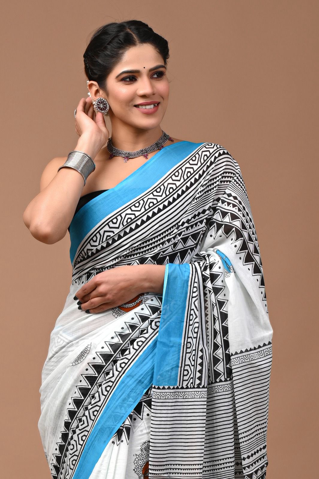 Pure  Mul cotton Hand print saree with Blouse.