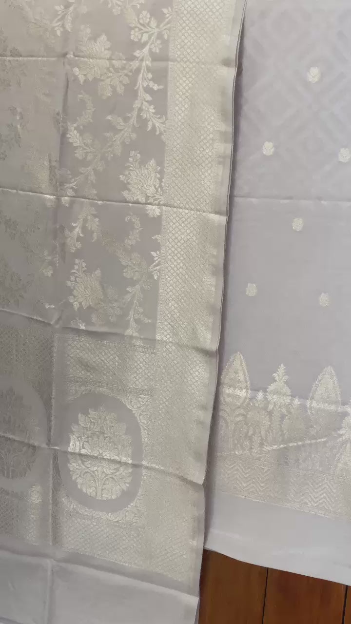 Pure Banarasi Munga Silk Weaved Unstitched Suit With Munga Silk Weaved Dupatta.