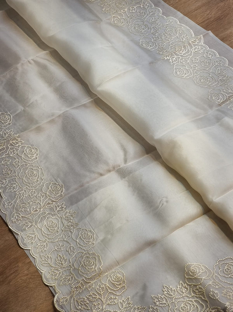 Pure Organza Silk Pearl Embroidery Cutwork Border Saree .