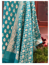 Pure Khaddi Georgette Unstitched Suit With Zari Work.